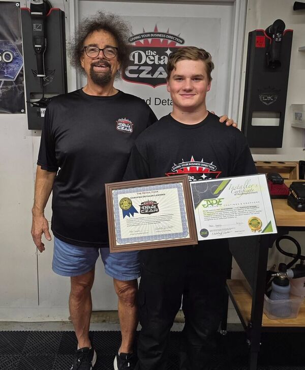 Gavin Rappach receiving his Detail Czar and Jade Ceramics installer certifications from Nicholas J. Vacco