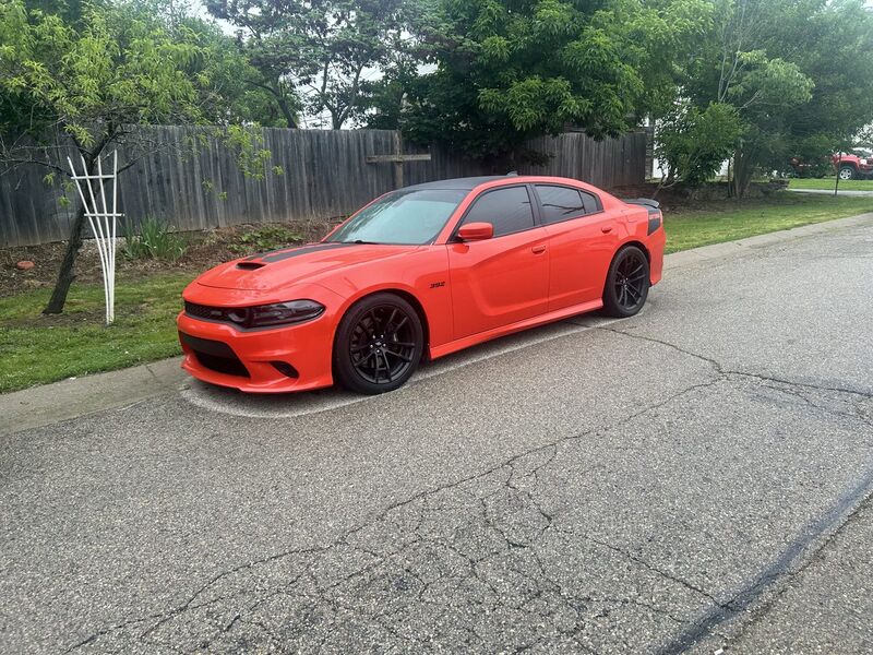 Orange Dodge Charger 392 after an exterior detail, paint showing deep gloss